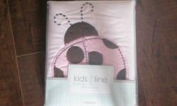 Selling a pink and brown Lady Bug Window Valance. (Never Used, still in package) Also Selling Matching Diaper Holder, also never used but out of package. Changed decor so didn't need for nursery. $5 each. Very cute for a little girl's room! Pet and Smoke