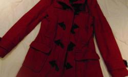 red winter coat
size med.
(#303 Route 14 Coleman)