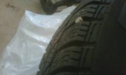 4 WINTER TIRES WITH BLACK RIMS.  WILL FIT MOST MINI COOPER MODELS.  ALL TIRES ARE IN GREAT SHAPE USED ONE SEASON.