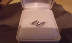 Beautiful 18k White Gold Diamond Ring Solitaire.  Paid $1100.00 for it in Sept, 2011.  Worn for 1 month.  Has been sized to a size 6.
Ring must go.