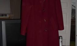 This is a dark reddish colour full length WOOL coat.  It is a ladies size 12.  In excellant condition.   Good quality  - D'Alliards brand.
 
Only $5.00 firm