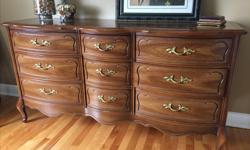 9 drawer wood dresser.
