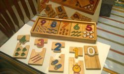 Solid wood Number Puzzle in solid wood case, complete with original box
Numbers 0 - 9 (two pieces per each number)
Very clean, wood is in perfect condition, no chips, scratches etc.
$15