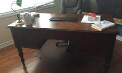Ashley "Eagle" brand desk
4 drawers
Desk is 60' x 29"
Includes chair