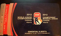 BELOW COST, FRONT ROW tickets to all ten Edmonton games to the IIHF World Junior Champion. Section 122, row 1, seat 11. Regular price of each ticket is $122.50.