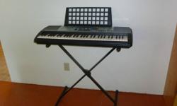 Yamaha PSR 225GM keyboard with stand.  Touch response keyboard.  New cost was over $500.  Just in time for Christmas! For complete specifications and features, see Yahmaha website: