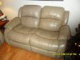 1 leather couche and 1 leather love seat