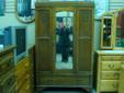 Antique Wardrobe with beveled glass mirror