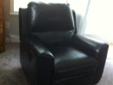 Black leather love seat and recliner