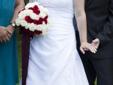 Ella wedding dress with earrings, necklace, and veil