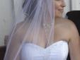 Ella wedding dress with earrings, necklace, and veil