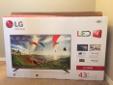 Like new: LG 43" 1080p LED TV - Silver Frame